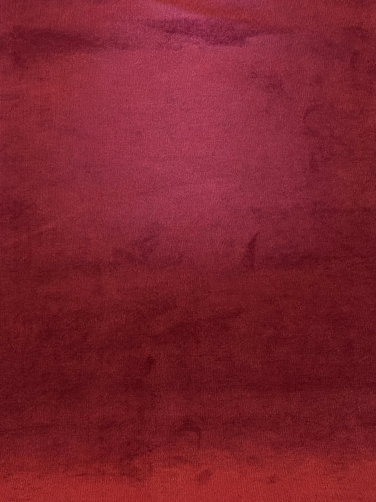 Crimson textured upholstery fabric